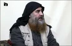 ?? AL-FURQAN MEDIA VIA AP, FILE ?? This file image made from video posted on a militant website purports to show the leader of the Islamic State group, Abu Bakr al-Baghdadi, being interviewe­d by his group’s Al-Furqan media outlet.