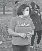  ?? MARC KOVAC/COLUMBUS DISPATCH ?? Democratic state Rep. Beth Liston talks to supporters at a campaign stop at Antrim Park on the North Side.