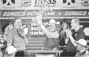  ?? /CHRIS GRAYTHEN/GETTY IMAGES ?? Scott Dixon celebrates winning the DXC Technology 600 at Texas Motor Speedway on Saturday, his 43rd IndyCar victory.