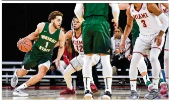  ?? NICK GRAHAM / STAFF ?? Wright State’s Justin Mitchell was in the Horizon League Top 5 in rebounds and assists last season and Top 10 in shooting percentage, but he’s off to a slow start this season for the Raiders.