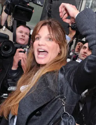  ??  ?? Cheering him on: Jemima Khan at one of Assange’s court hearings in 2010