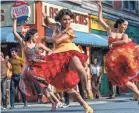  ?? NIKO TAVERNISE ?? As Anita, Ariana DeBose, center, dances to “America” in Steven Spielberg’s upcoming “West Side Story.”