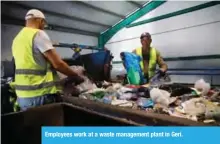  ??  ?? Employees work at a waste management plant in Geri.