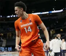  ?? Sarah Stier/Getty Images ?? Syracuse forward Jesse Edwards celebrates a second-round win against West Virginia on Sunday at Bankers Life Fieldhouse in Indianapol­is.