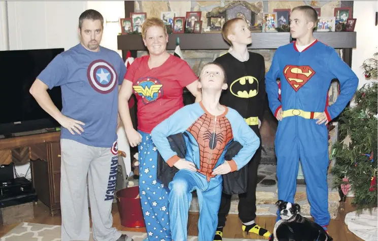 ?? PHOTOS: AMY WILSON ?? Even as her oldest son turns 20, Amy Wilson says her boys like dressing up in matching pyjamas for the holidays. The boys are seen below at a Christmas past.