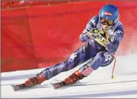  ?? Alain Grosclaude / Getty Images ?? Mikaela Shiffrin remained tied with Lindsey Vonn for the women’s mark of 82 World Cup wins after finishing seventh in the FIS Alpine ski World Cup women's downhill on Saturday in Cortina d'Ampezzo, Italy.