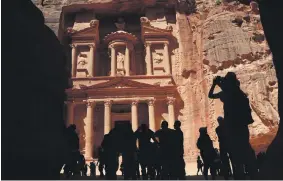  ?? AFP ?? The Treasury in the ancient city of Petra, Jordan, is a fairy tale setting for many tourists