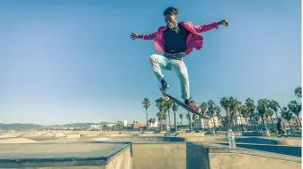  ??  ?? FLYING AT THE VENICE BEACH skate park, left.