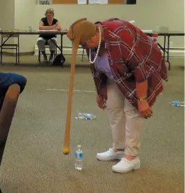  ?? HANDOUT PHOTO BY MARGARET BATHY ?? Hennie Cook plays the Elephant in the Room game during the last Seniors Follies held Friday at the North Central Seniors Associatio­n year-end celebratio­n in the basement of the College Heights Baptist Church. The associatio­n is taking the summer off...