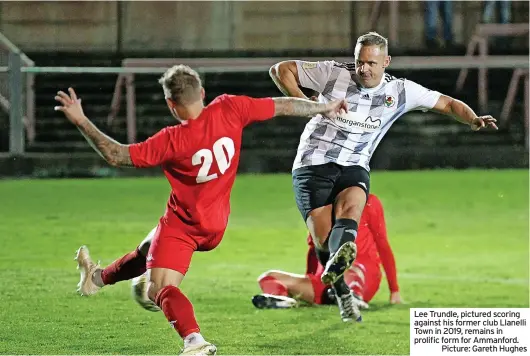  ?? Picture: Gareth Hughes ?? Lee Trundle, pictured scoring against his former club Llanelli Town in 2019, remains in prolific form for Ammanford.