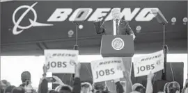  ?? Sean Rayford Getty Images ?? PRESIDENT TRUMP speaks at a Boeing plant in North Charleston, S.C., where he vowed to expand the American dream and focus on keeping jobs in the U.S.