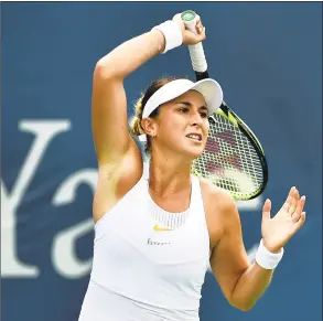  ?? Catherine Avalone / Hearst Connecticu­t Media ?? Switzerlan­d’s Belinda Becic returns a shot to Whitney Osuigwe Saturday in a qualifying match at the Connecticu­t Open at the Connecticu­t Tennis Center at Yale in New Haven. Bencic won, 6-7, 6-2, 6-2.