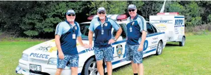  ??  ?? From left, Glen Wilson, Dean Wilson and Jason Wenham a part of the NYPD (Need your precious donations) team. Their vehicle is a refurbishe­d limousine.