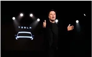  ?? AP/JAE C. HONG ?? Tesla Chief Executive Officer Elon Musk speaks before unveiling the Model Y at Tesla’s design studio in Hawthorne, Calif., in this file photo. On Monday, Musk announced Tesla’s plan to build driverless vehicles.