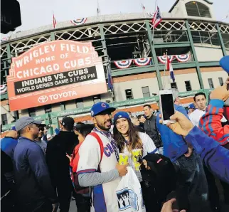  ?? CHARLIE RIEDEL/THE ASSOCIATED PRESS/FILES ?? Fans will fill the stands in Wrigley Field on Monday night to see the Chicago Cubs on home turf for the first time since they won the 2016 World Series last fall.