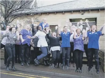  ?? PHOTOS BY BRUCE FITZGERALD ?? THREE CHEERS: Delighted Overgate Hospice staff celebrate hitting the Leap Year Appeal target