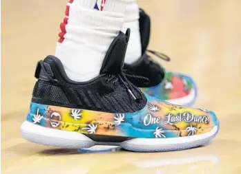  ?? LYNNE SLADKY/AP ?? Dwyane Wade wore shoes that say “One Last Dance” during the first half of a game against the Knicks on Oct. 24 in Miami. This season will be Wade’s last after 16 years in the NBA.