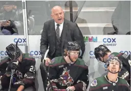  ?? MICHAEL CHOW/THE REPUBLIC ?? Coyotes coach Andre Tourigny, top center, has his team riding a nine-game point streak, the team’s longest since 2012.