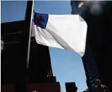  ?? CRAIG F. WALKER/GLOBE STAFF ?? A Christian flag-raising was held at City Hall in Boston earlier this month.