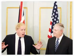  ??  ?? US Secretary of State Rex Tillerson and Britain's Foreign Secretary Boris Johnson attend a press conference in London Monday. (Reuters)