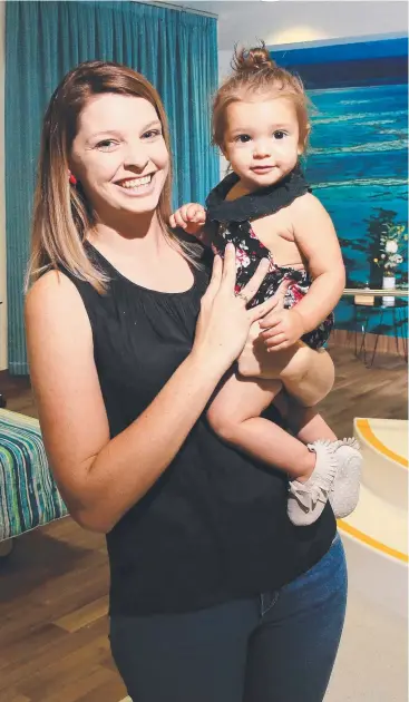  ?? Picture: JUSTIN BRIERTY ?? CELEBRITY: Cairns Hospital Family Birth Centre is celebratin­g its first birthday with the very first baby born in the centre, Gianna Mae Vozzo, with her mum Julie.