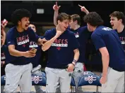  ?? JOSE CARLOS FAJARDO — BAY AREA NEWS GROUP ?? From left, Saint Mary's players Chris Howell, Aidan Mahaney, Kyle Bowen and Alex Ducas react while watching the NCAA Basketball Championsh­ip Selection Show on television Sunday. The Gaels are seeded fifth in the West Region and will face VCU in the first round.
VCU at Saint Mary's
Friday, 11 a.m.
TBS