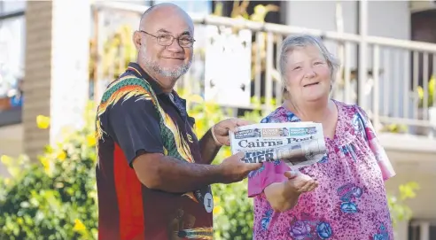  ??  ?? BARGAIN BUY: Delivery driver Karl Buderus with Cairns Post reader Desley Moule from Bungalow. Picture: ANNA ROGERS