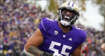  ?? Associated Press file photo ?? Washington offensive lineman Troy Fautanu started every game the past two seasons for the Huskies. For all previous Steelers visits, visit Post-Gazette.com.