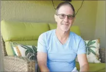  ?? AP photo ?? Scott Berkheiser, 57, who has Alzheimer’s disease, sits for a portrait at his home Friday, April 5, 2024, in Venice, Fla. Insurance denials delayed Berkheiser’s first Leqembi infusion a few months until last December.