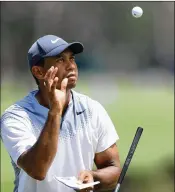  ?? SAM GREENWOOD / GETTY IMAGES ?? “Eventually I was going to put all the pieces together and today, for the most part, I did that,” Tiger Woods said of his third round on Saturday.