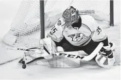  ?? ANDREW NELLES / THE TENNESSEAN ?? Predators goaltender Pekka Rinne makes a stop in the third period of Game 1 on Thursday. Rinne is the first NHL goaltender in seven years to start a playoff series with two shutouts.