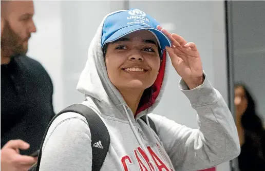  ?? AP ?? Rahaf Mohammed Alqunun, 18, arrives at Toronto Pearson Internatio­nal Airport yesterday,