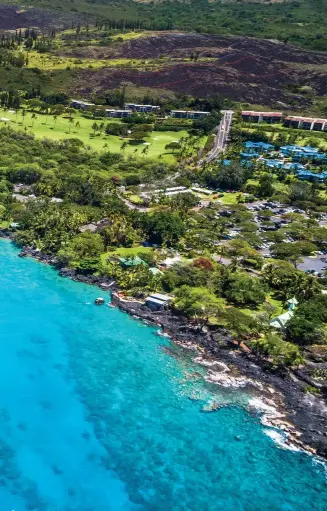  ??  ?? Land meets sea: The rugged Kona coastline is situated in the lee of the mountains including Mauna Loa, which is more than 13,000 feet tall.