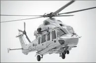  ?? LIU YANG / FOR CHINA DAILY ?? An AC352 utility helicopter is seen during its maiden flight on Tuesday.