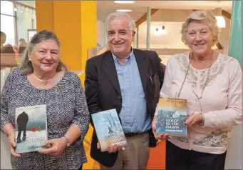  ??  ?? Charles Egan at his book signing with his wife Carmel and sister in law Patricia Murray