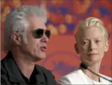  ?? John Phillips/Getty Images ?? Jim Jarmusch and Tilda Swinton discuss “The Dead Don’t Die” during last month’s Cannes Film Festival in Cannes, France. The tongue-in-cheek zombie movie opened the annual festival.