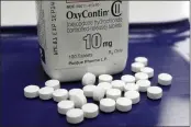  ?? TOBY TALBOT — THE ASSOCIATED PRESS FILE ?? OxyContin pills are arranged at a pharmacy located in Montpelier, Vt.