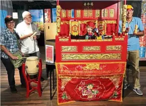  ??  ?? With a limited visitor capacity when it reopens, the Penang House of Music is expected to develop more online content to keep its programmes going. (Right) a traditiona­l Chinese puppet theatre set at the museum, which has been a hit with visitors. — Photos: PHOM