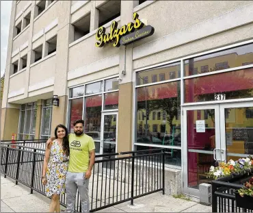  ?? ?? Married couple Deepika (left) and Jay Singh manage Gulzar’s Indian Cuisine, new at 217 N. Patterson Blvd., Dayton.