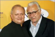  ?? THIBAULT CAMUS — ASSOCIATED PRESS FILE PHOTO ?? In this Sept. 7, 2014 file photo, French chef Joel Robuchon, left, poses for photograph­ers with French chef Alain Ducasse during a photocall for the movie “The Hundred-Foot Journey”, in Paris, Sunday, Sept. 7, 2014. French master chef Joel Robuchon has...