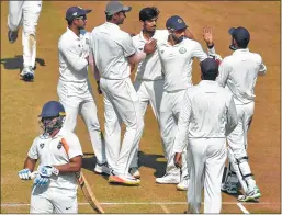  ??  ?? Vidarbha bowler Rajneesh Gurbani celebrates with his teammates after dismissing Delhi's team captain Rishabh Pant during the Ranji Trophy final match in Indore on Friday.
