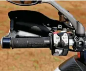  ??  ?? LEFT: Ride modes, settings, electronic­s and cruise control are controlled via this switch cluster