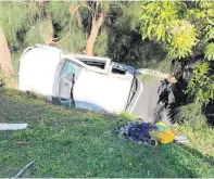  ??  ?? The car had rolled down a three-metre bank.