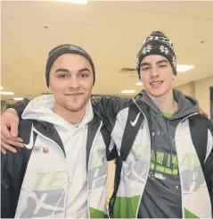  ?? JASON MALLOY/SALTWIRE NETWORK ?? Team P.E.I. hockey manager Tanner Doiron, left, and player Matt McQuaid left for Red Deer, Alta., where the Canada Games begin tonight with the opening ceremonies.