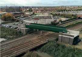  ?? FoGCR ?? The bridge over the Midland Main Line in Loughborou­gh will link two heritage railways, creating an 18-mile steam highway between the outskirts of Nottingham and Leicester.