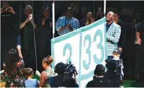  ??  ?? FORMER Boston Celtics player Paul Pierce (#34) raises a banner retiring his number during a ceremony in his honor on Feb. 11 in Boston, Massachuse­tts.