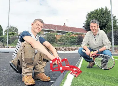  ?? Picture: Gareth Jennings. ?? West End Tennis Club member Colin Birtwhistl­e watches Darren Bain, from Doe Sports Ltd, lay the new surface on the courts.