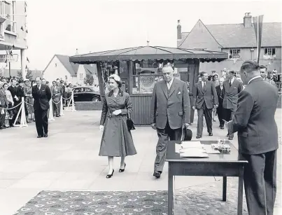  ??  ?? The Queen and Duke of Edinburgh (back, third right) with town dignitarie­s during a visit to Glenrothes in 1958.