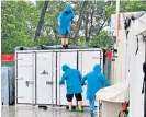  ?? ?? Wet weather woe: The scene at Imola yesterday as more heavy rain falls