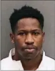  ?? TAMPA POLICE DEPARTMENT VIA AP ?? Howell Emanuel Donaldson, the suspect in a string of four slayings that terrorized a Tampa neighborho­od was arrested after he brought a loaded gun to his job at a McDonald’s and asked a coworker to hold it, authoritie­s said.